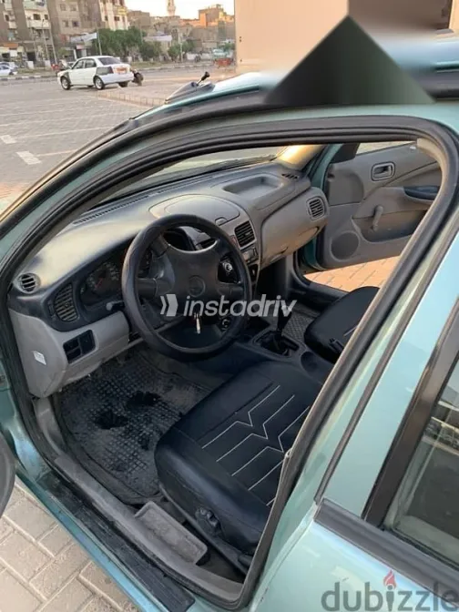 نيسان صنى 2002 أخضر مستعملة للبيع - 8