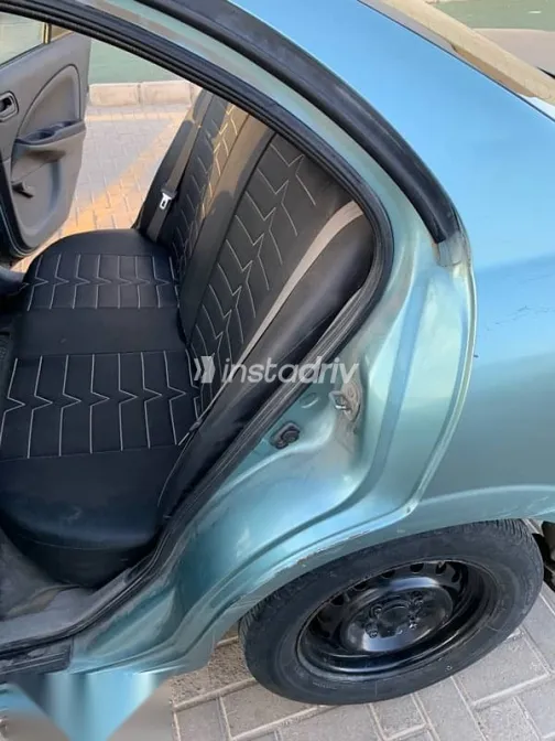 نيسان صنى 2002 أخضر مستعملة للبيع - 9