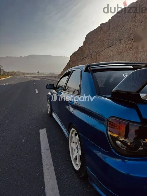 سوبارو امبريزا 2004 أزرق غامق مستعملة للبيع - 2