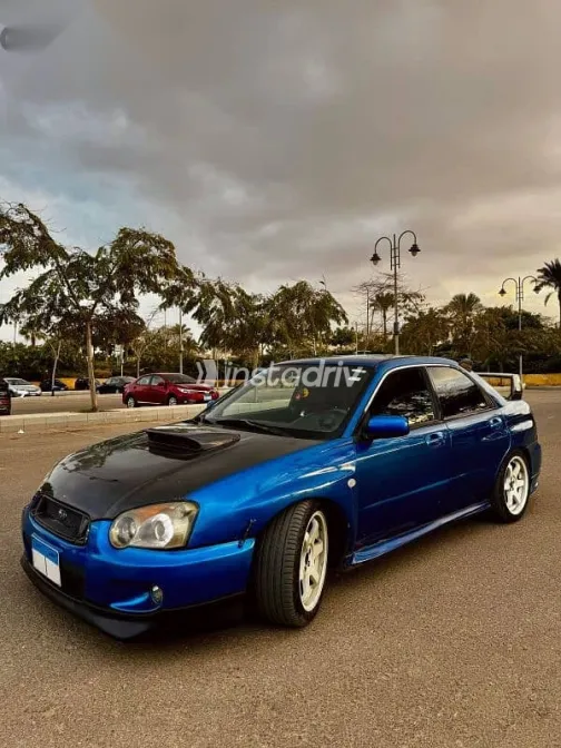 سوبارو امبريزا 2004 أزرق غامق مستعملة للبيع - 3