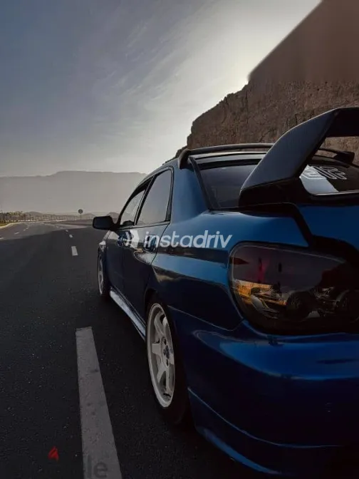 سوبارو امبريزا 2004 أزرق غامق مستعملة للبيع - 4