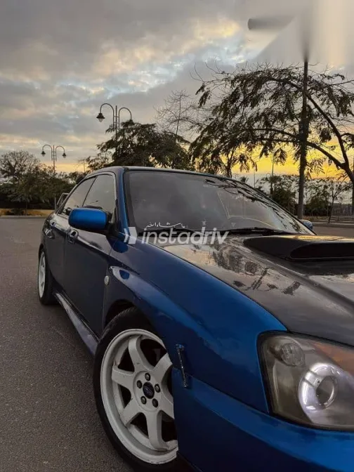 سوبارو امبريزا 2004 أزرق غامق مستعملة للبيع - 7