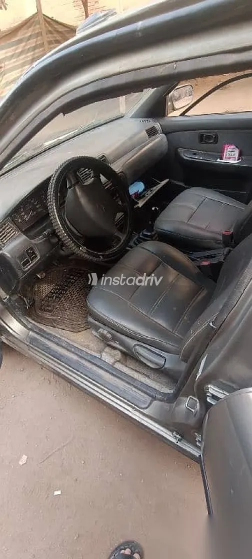 نيسان صنى 1999 ذهبي مستعملة للبيع - 2