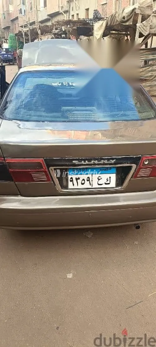 نيسان صنى 1999 ذهبي مستعملة للبيع - 5