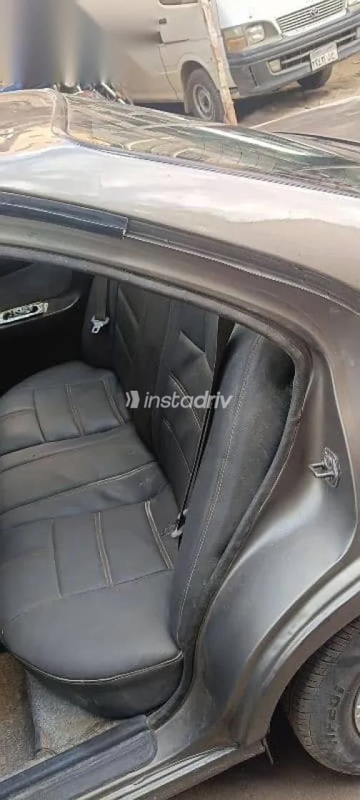 نيسان صنى 1999 ذهبي مستعملة للبيع - 6