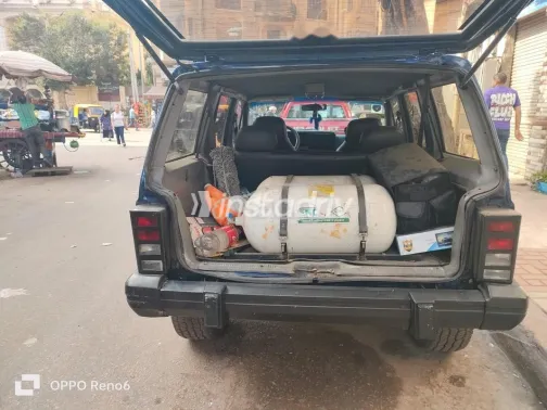 جيب شيروكي 1996 أزرق غامق مستعملة للبيع - 5