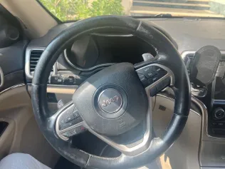 جيب جراند شيروكي 2015 أبيض مستعملة للبيع