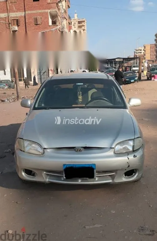 هيونداي اكسنت 2005 فضي مستعملة للبيع - 1