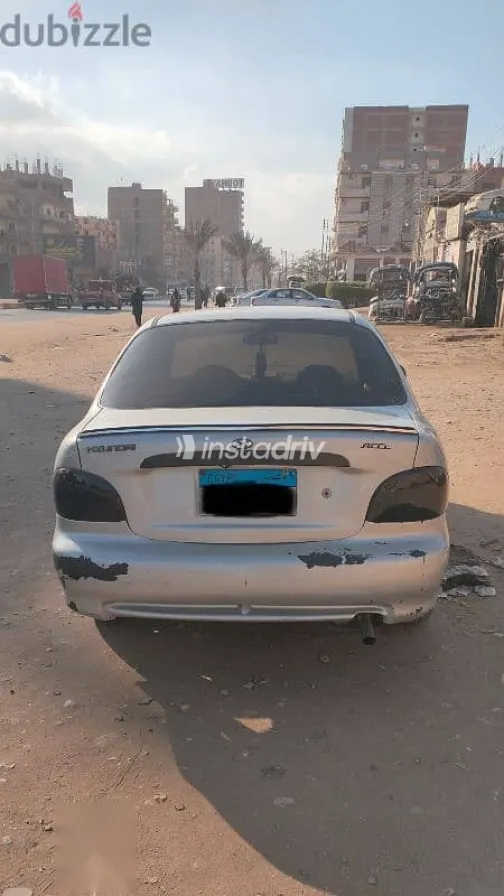 هيونداي اكسنت 2005 فضي مستعملة للبيع - 2