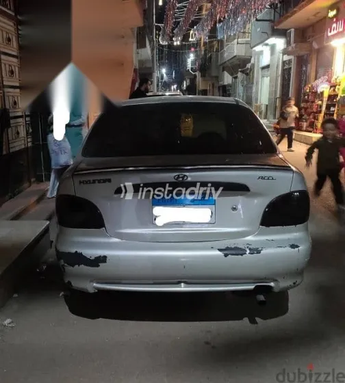 هيونداي اكسنت 2005 فضي مستعملة للبيع - 9