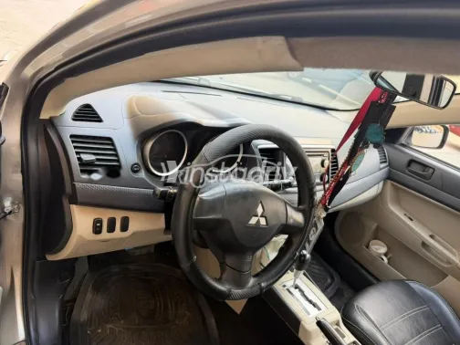 ميتسوبيشي لانسر اى اكس شارك 2014 فضي مستعملة للبيع - 5