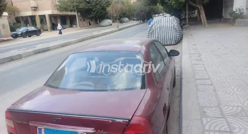 دايو نوبيرا 2 2001 أحمر غامق مستعملة للبيع - 3