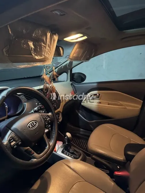 كيا ريو 2012 أزرق غامق مستعملة للبيع - 8