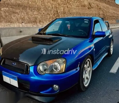 سوبارو امبريزا 2004 أزرق غامق مستعملة للبيع - 1