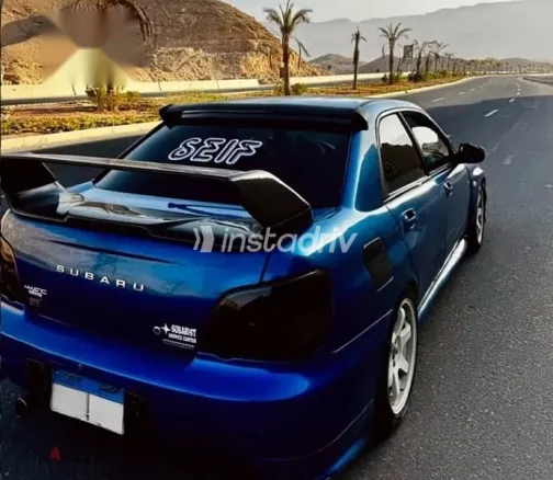 سوبارو امبريزا 2004 أزرق غامق مستعملة للبيع - 2