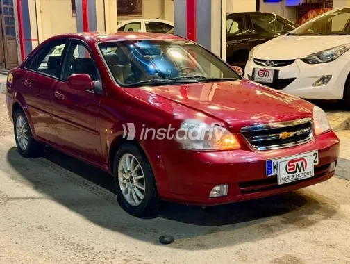 شيفروليه أوبترا 2011 أحمر مستعملة للبيع - 2