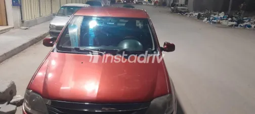 رينو لوجان 2012 أحمر مستعملة للبيع - 1