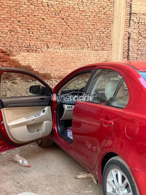 ميتسوبيشي لانسر اى اكس شارك 2017 أحمر مستعملة للبيع - 1