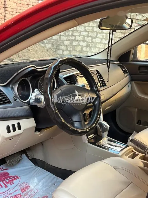 ميتسوبيشي لانسر اى اكس شارك 2017 أحمر مستعملة للبيع - 2