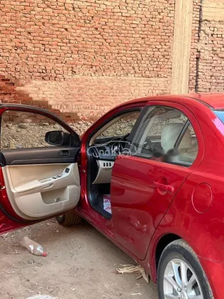 ميتسوبيشي لانسر اى اكس شارك 2017 أحمر مستعملة للبيع