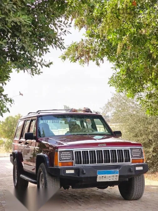 جيب شيروكي 1995 أحمر مستعملة للبيع - 2