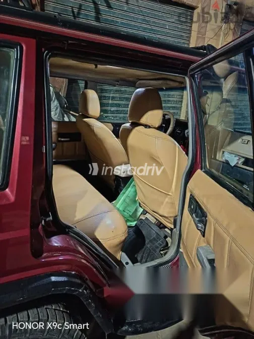 جيب شيروكي 1995 أحمر مستعملة للبيع - 5