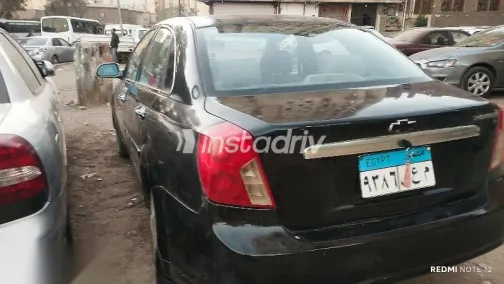 شيفروليه أوبترا 2010 أسود مستعملة للبيع - 2