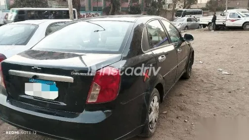 شيفروليه أوبترا 2010 أسود مستعملة للبيع - 3