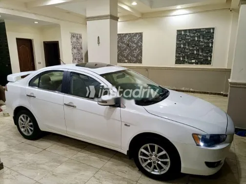 ميتسوبيشي لانسر 2016 أبيض مستعملة للبيع - 2