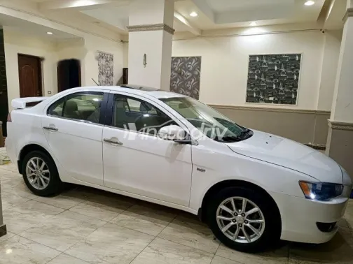 ميتسوبيشي لانسر 2016 أبيض مستعملة للبيع - 5