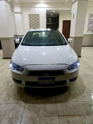 ميتسوبيشي لانسر 2016 أبيض مستعملة للبيع