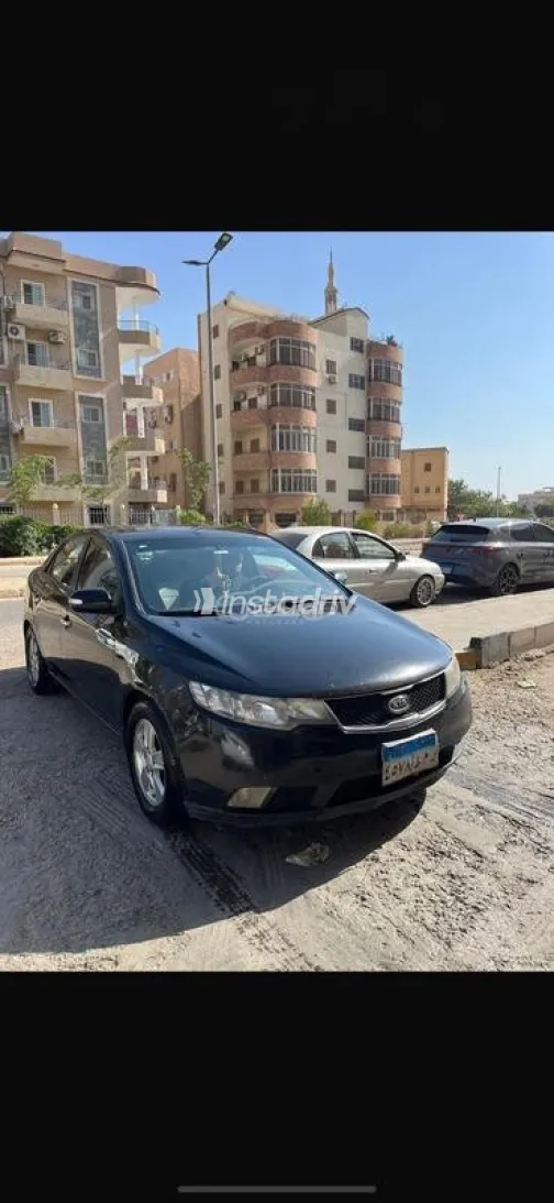 كيا سيراتو 2010 أسود مستعملة للبيع - 2