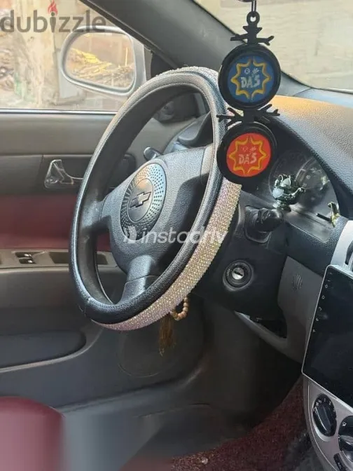 شيفروليه أوبترا 2006 فضي مستعملة للبيع - 1