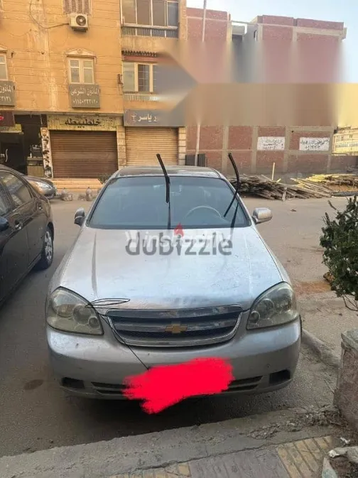 شيفروليه أوبترا 2006 فضي مستعملة للبيع - 5
