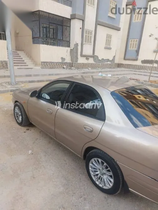 دايو نوبيرا 2006 ذهبي مستعملة للبيع - 2