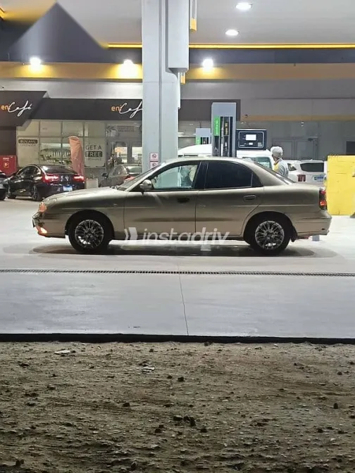 دايو نوبيرا 2006 ذهبي مستعملة للبيع - 9