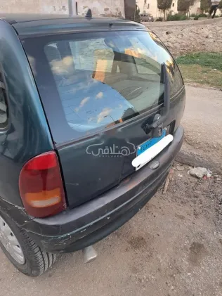 اوبل كورسا 1998 أخضر غامق مستعملة للبيع