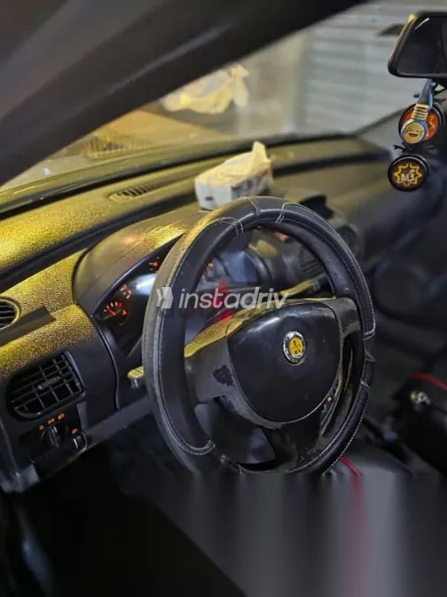 اوبل كورسا 2004 رمادي مستعملة للبيع - 1