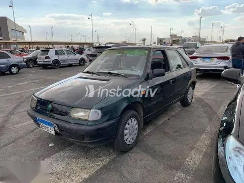 سكودا فيليشيا 1995 أبيض مستعملة للبيع - 1