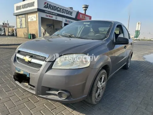 شيفروليه افيو 2013 فضي مستعملة للبيع - 1