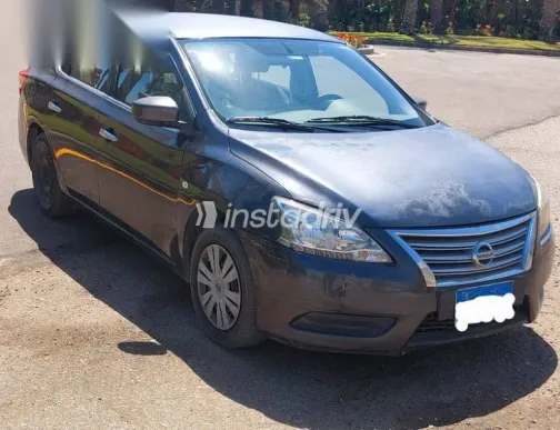 نيسان سنترا 2015 رمادي مستعملة للبيع - 1