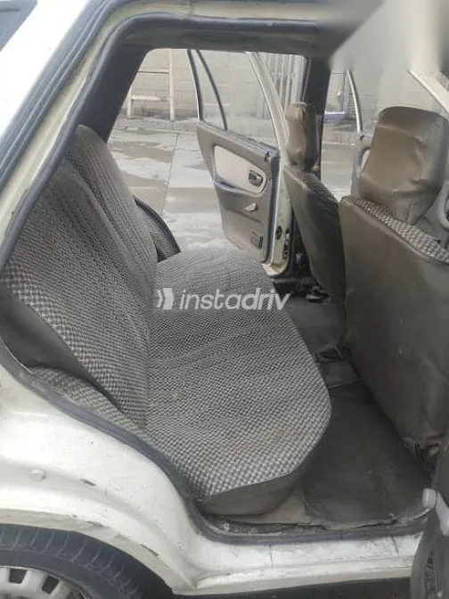 هيونداي اكسيل 1990 أبيض مستعملة للبيع - 7