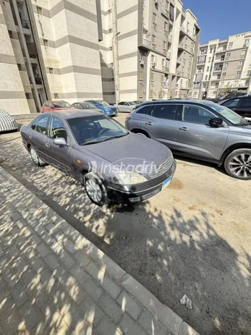 نيسان صنى 2009 بنفسجي مستعملة للبيع - 2