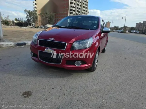 شيفروليه افيو 2014 أحمر مستعملة للبيع - 1