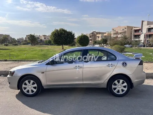 ميتسوبيشي لانسر اى اكس شارك 2013 فضي مستعملة للبيع - 2