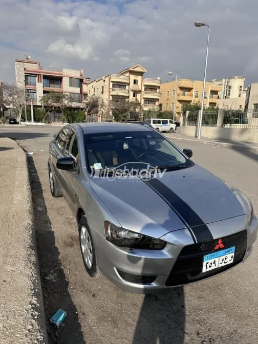 ميتسوبيشي لانسر اى اكس شارك 2013 فضي مستعملة للبيع - 3