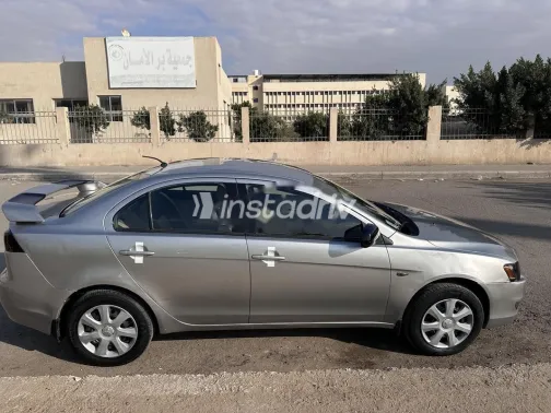 ميتسوبيشي لانسر اى اكس شارك 2013 فضي مستعملة للبيع - 4