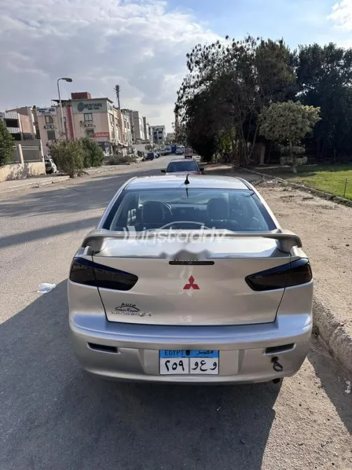 ميتسوبيشي لانسر اى اكس شارك 2013 فضي مستعملة للبيع - 5