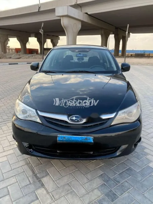 سوبارو امبريزا 2010 أسود مستعملة للبيع - 2