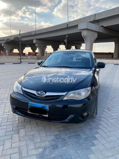 سوبارو امبريزا 2010 أسود مستعملة للبيع - 3